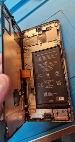 The inside of a phone with the screen held open at a 90° angle